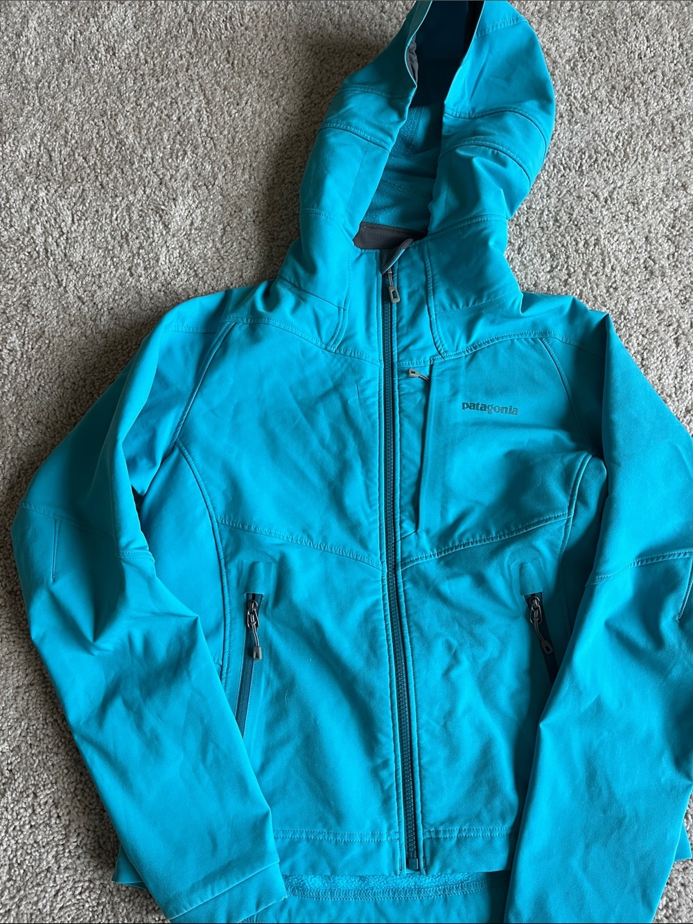 Patagonia Women’s Turquoise Hooded Rain Jacket